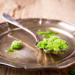 Sorrel granita in metal spoon. 