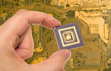 Microprocessor in hand over printed circuit board