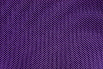 Purple and violet fishnet cloth material as a texture background