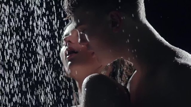 a young woman and a young man in the shower