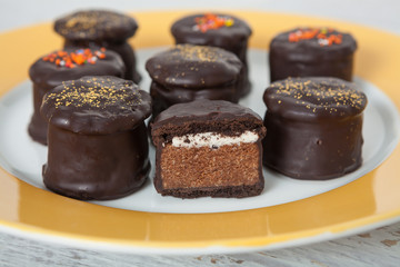 Chocolate candy with topping