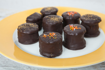 Chocolate candy with topping