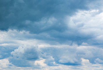 white fluffy clouds in the blue sky