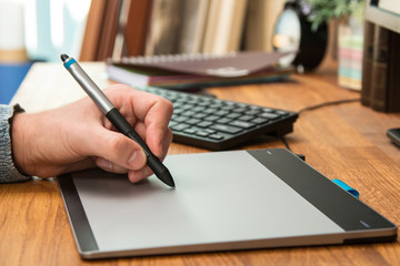 Man during using a graphic tablet