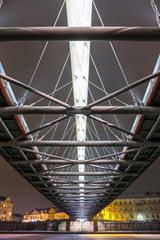 Fototapeta premium Bernatka footbridge over Vistula river in the night in Krakow, Poland