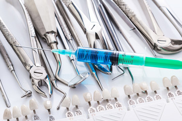 Dental tools and syringe with anesthesia