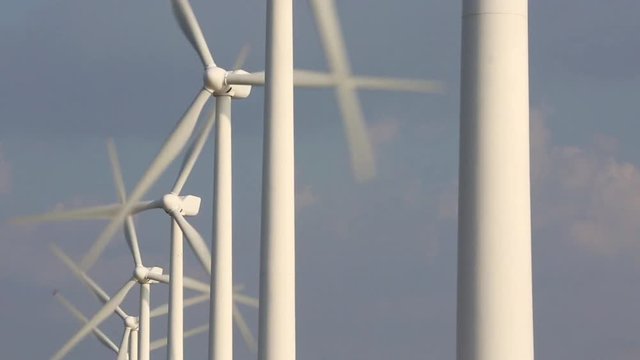 View of turbines of wind farm on the shore of Puttalam Lagoon in Sri Lanka 