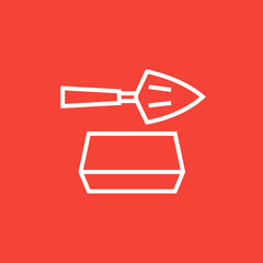 Spatula with brick line icon.