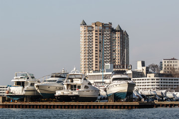 pier with yachts in Vladivostok in anticipation of the opening of navigation