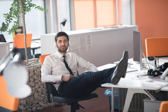 relaxed young business man at office