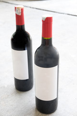 Two red wine bottle, with real paper blank label