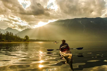 Foto op Canvas The man in a kayak on Lake Baikal © greenlex