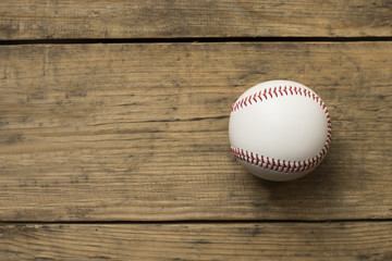 baseball on old brown and vintage table background