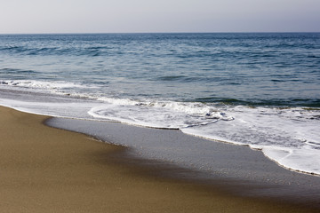 Pacific ocean is clear day. Beach landscape in the US with the blue sea.