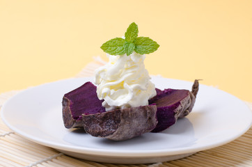 Purple sweet potatoes with whipping cream on top