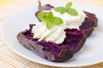 Purple sweet potatoes with whipping cream on top