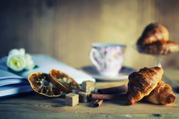 tea cup croissant book