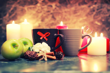 night table with mug and candle