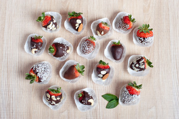 Strawberry covered with milk and dark chocolate