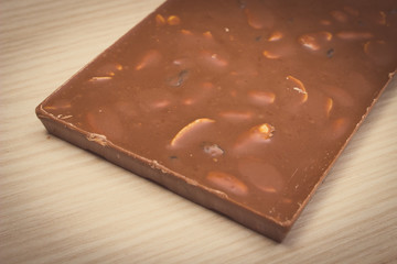 Vintage photo, Whole nutritious chocolate with nuts and raisins
