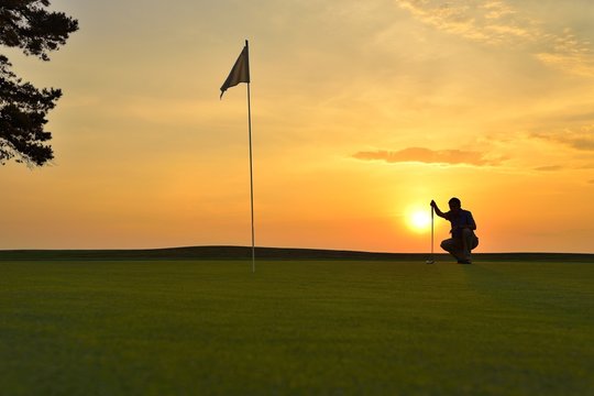 Golfer Playing Off the Tee Box