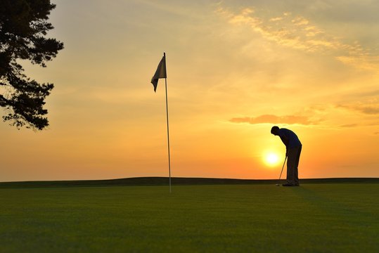 Golfer Playing Off the Tee Box
