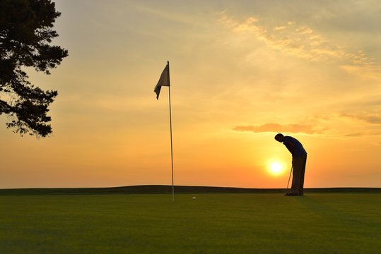 Golfer Playing Off the Tee Box