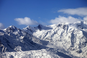 Snowy mountains and glacier at sunny day