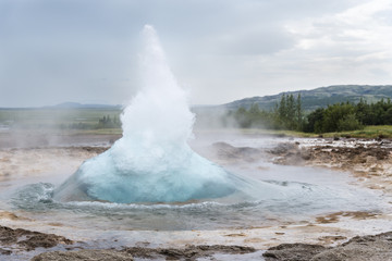 The Great Geyser erupting. Strokkur. Golden Ring. Iceland.