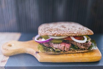 Sandwich with bavette and fresh vegetables - healthy diet