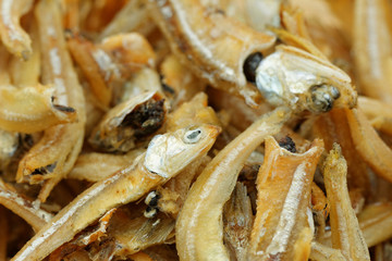 Fried small anchovies. Close up.
