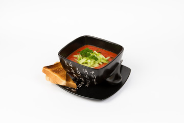 Image of tasty tomato soup with bread