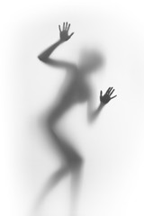 Silhouette of a woman, hands, fingers and diffused body.