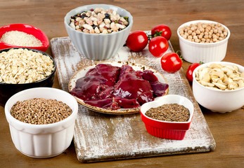 Foods highest in Copper on a wooden board