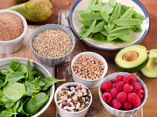 Foods rich in Fiber on wooden table.