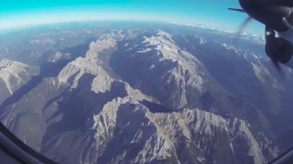 Aerial view of the mountains from a plane window