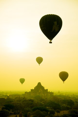 Silhouette balloon over a pagoda field in an ancient city on the sunrise, Myanmar
