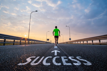 Man running toward success
