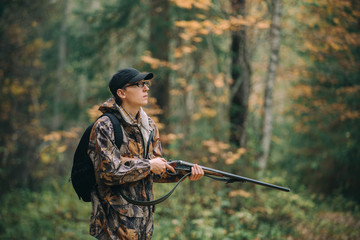 Male hunter in the woods