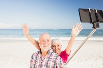 Senior couple taking selfie