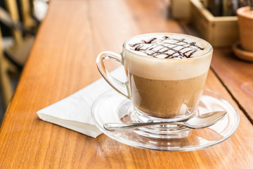 coffee cup on wooden table ,soft focus