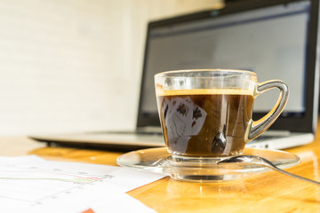 coffee cup on wooden table ,soft focus