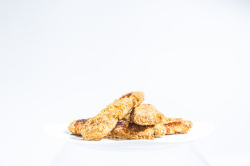 Plate of Chicken Fingers, Fried Frozen Food at Home