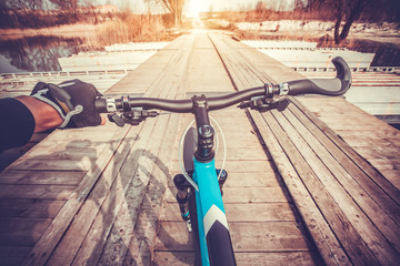 View from bikers eyes. riding on the bridge