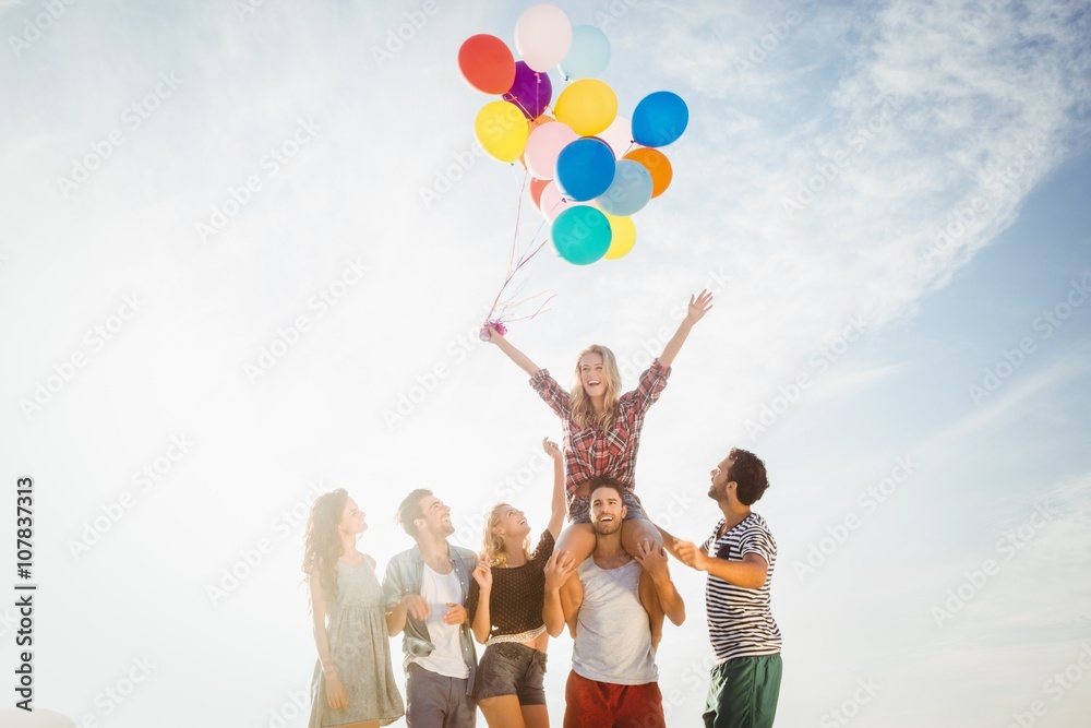 Sticker portrait of friends holding balloon