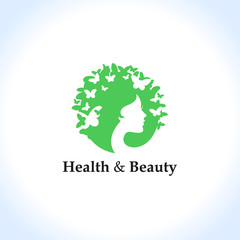 Health and beauty logo concept: woman's face and butterflies. Logo for beauty salon, massage, cosmetics, spa or medical clinic. Flat design.
