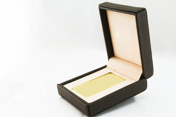 gold ingot in black box