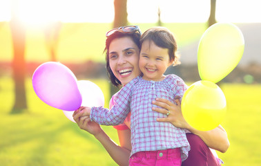Happy loving family. mother and child girl playing © tutye