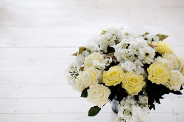 bunch of beautiful artificial rose flowers on a floor