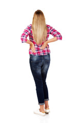 Young woman with back pain
